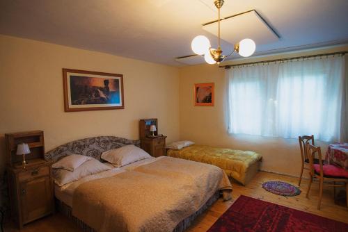 Posteľ alebo postele v izbe v ubytovaní Chalupa Ferka Pavlíka