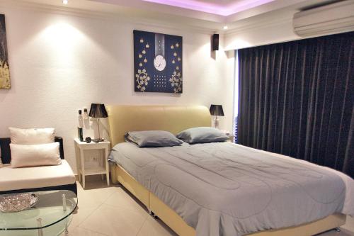 Postel nebo postele na pokoji v ubytování View Talay 6 Central apartment
