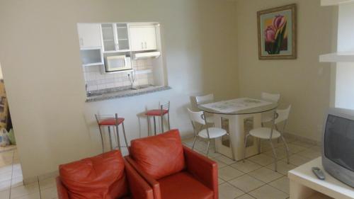 TV a/nebo společenská místnost v ubytování Royal Park Caldas Novas