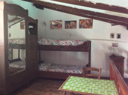 Dviaukštė lova arba lovos apgyvendinimo įstaigoje Bella baita open space con soppalco