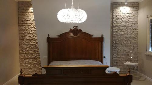 Postel nebo postele na pokoji v ubytování B&B Gocciaverde