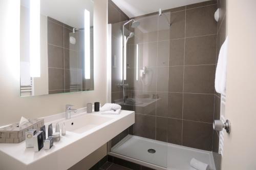 Koupelna v ubytování Best Western Plus Hôtel & Spa de Chassieu