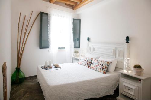 Ένα ή περισσότερα κρεβάτια σε δωμάτιο στο Storie di mare