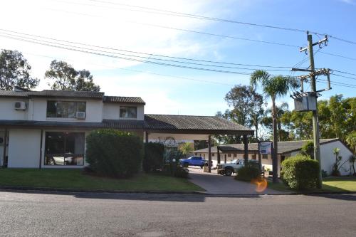 a house with a fire hydrant in the street at Parkhaven in Nowra