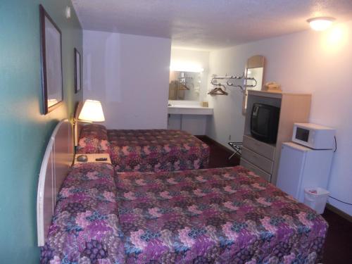 Cama o camas de una habitación en Arcola Inn