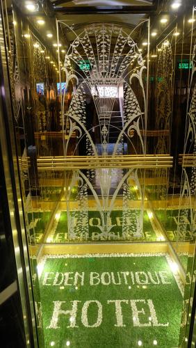 a display window of a store with a building at Eden Boutique Hotel & Spa in Sa Pa