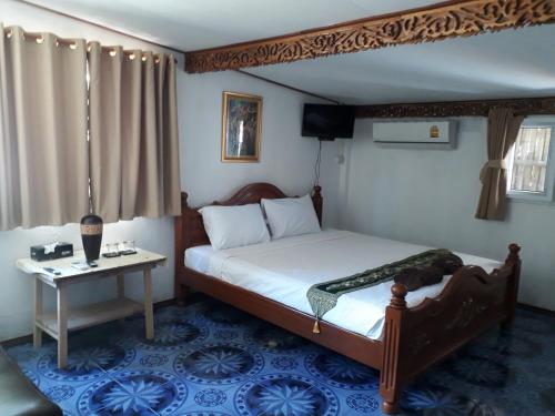 Un pat sau paturi într-o cameră la Seaside home