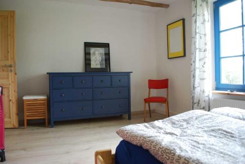 Katil atau katil-katil dalam bilik di Ferienhaus Villa Apfelbaum
