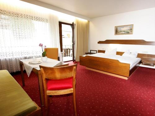 Postel nebo postele na pokoji v ubytování Hotel Kühler Brunnen mit Gästehaus