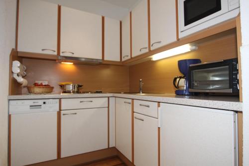 A cozinha ou cozinha compacta de Apart Rustica