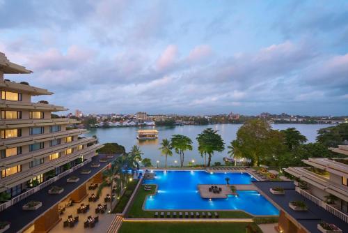 an aerial view of a hotel with a large swimming pool at Cinnamon Lakeside in Colombo