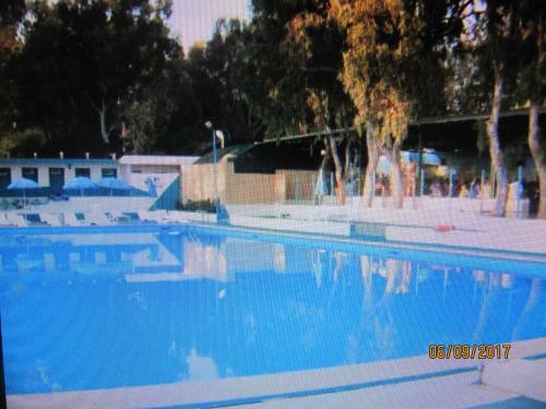 Bazén v ubytování villetta al mare punta braccetto nebo v jeho okolí
