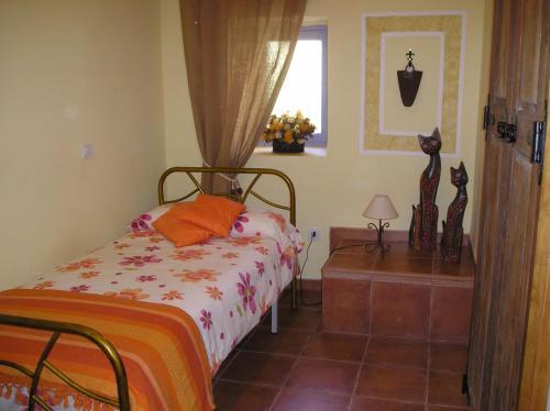 Rúm í herbergi á Casapancho 1 y 2 - Casa Rural - Fasnia - Tenerife