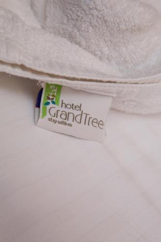 a tube of hotel grandrite snow white shirt at Hotel Grand Tree in Coimbatore