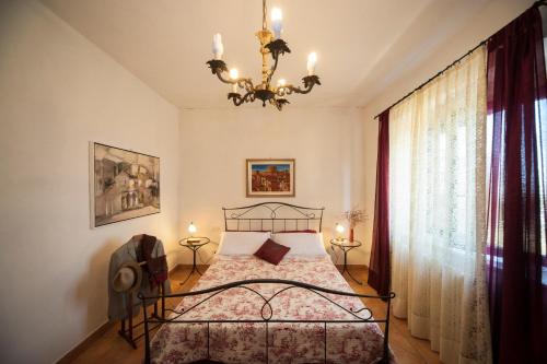 Katil atau katil-katil dalam bilik di Agriturismo Podernuovo