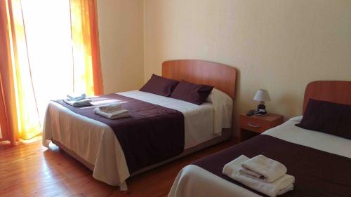 Postel nebo postele na pokoji v ubytování Hostal Sol de Atacama