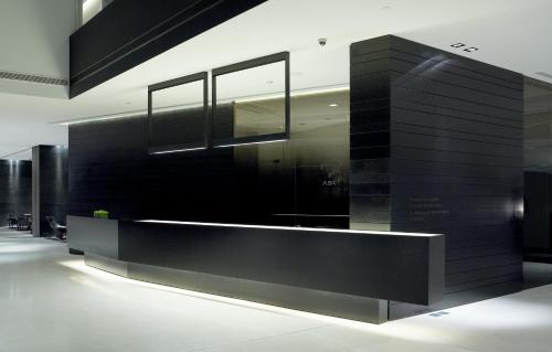 a black counter in a room with at The Met Hotel in Thessaloniki