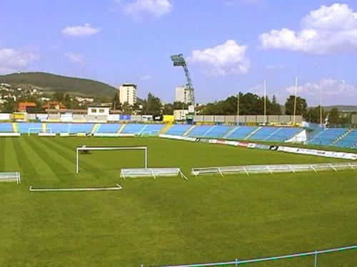 a soccer field with a soccer ball on a field at Hotel Štadión in Košice