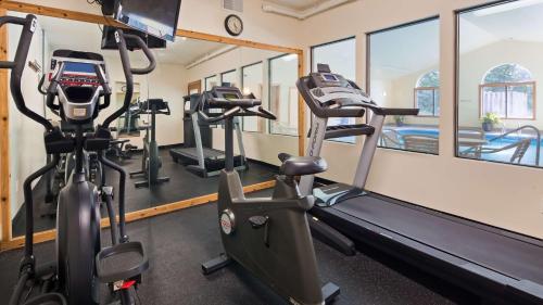 a gym with two tread machines and a treadmill at Best Western Plaza Hotel Saugatuck in Saugatuck