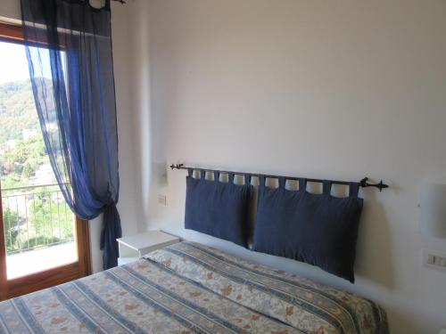 Ένα ή περισσότερα κρεβάτια σε δωμάτιο στο Garaventa Angelo Apartments