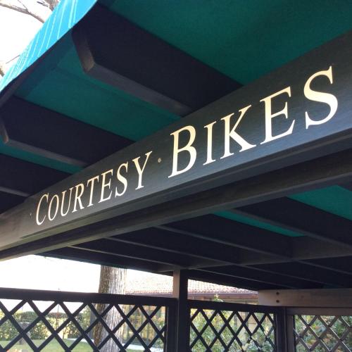 a sign that reads conflicted bikes on a building at Villa Abbondanzi Resort in Faenza
