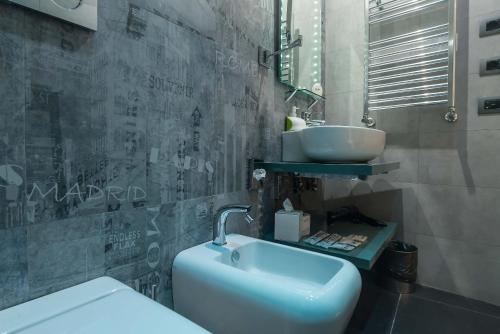 a bathroom with a sink and a toilet at Pantheon Caesar Relais in Rome