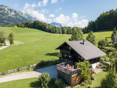 an aerial view of a house in a field at Ausseer Chalet (nahe Hallstatt), Ferienhaus in Bad Aussee