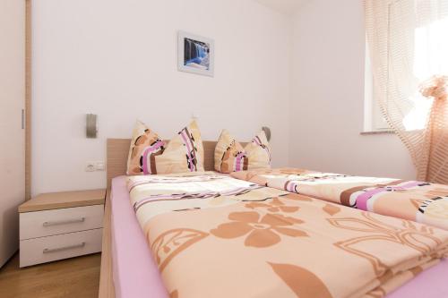 Postel nebo postele na pokoji v ubytování Villa Janja