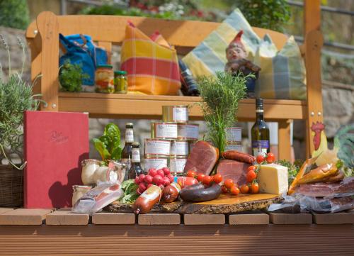 a display of food and vegetables on a table at Hotel Rose in Bretzfeld