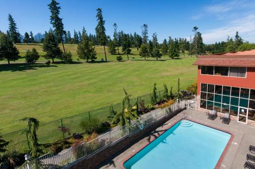 an overhead view of a swimming pool in a yard at Olympic Lodge by Ayres in Port Angeles
