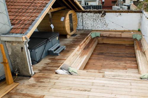 an overhead view of a patio with a wooden floor at Villa Wellington in Ostend