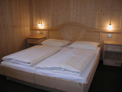Voodi või voodid majutusasutuse Gasthof Lechner toas