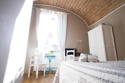 Кровать или кровати в номере Le Erbe Guest House