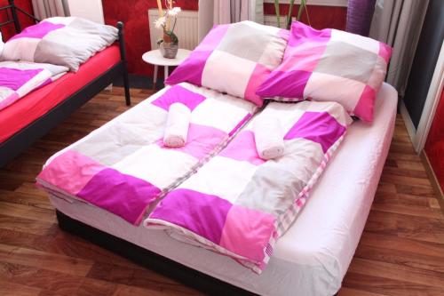 Ένα ή περισσότερα κρεβάτια σε δωμάτιο στο Oase der Ruhe