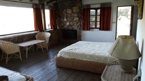 מיטה או מיטות בחדר ב-La Tahona