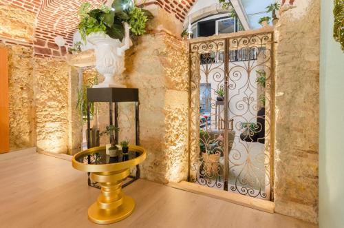 TV a/nebo společenská místnost v ubytování Hotel Borges Chiado