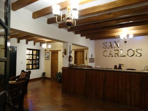 El vestíbulo o zona de recepción de Hotel Hospederia San Carlos Villa De Leyva