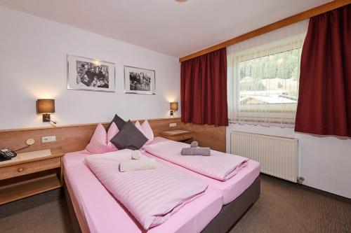 Katil atau katil-katil dalam bilik di Apartments Neue Post