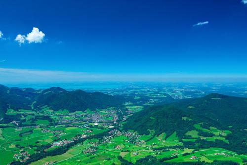 an aerial view of a town in the mountains at Gästehaus Schröder in Ruhpolding