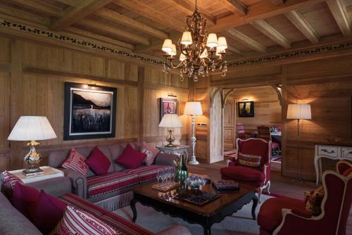 a living room with a couch and a table at Michlifen Resort & Golf in Ifrane