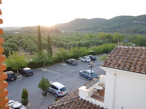 a view of a parking lot with cars parked at Los Dólmenes in Antequera
