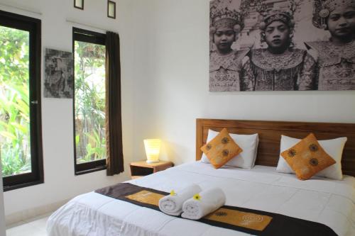 Ubud Rooms B&B 객실 침대