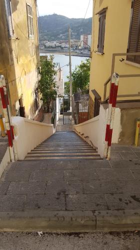 a stairway leading up to a building with a view of the water at B&B Vistamare Suite in Agropoli