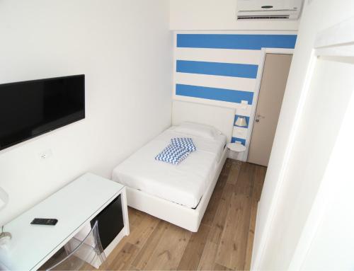 Posteľ alebo postele v izbe v ubytovaní Domus Nova