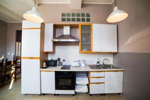 Kuchyň nebo kuchyňský kout v ubytování Casa Mappamondo