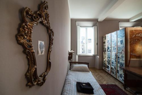 Postel nebo postele na pokoji v ubytování Casa Mappamondo
