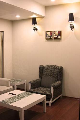 Zona de estar de Hotel Natraj