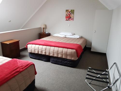 Postel nebo postele na pokoji v ubytování Bay Palm Motel