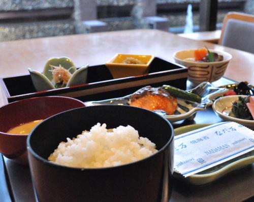 a tray of food with rice and vegetables on a table at Nagoya Tokyu Hotel in Nagoya