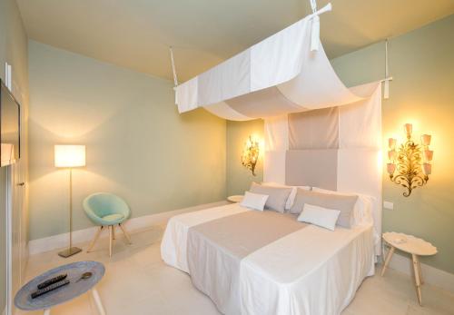 Een bed of bedden in een kamer bij Castello di San Marco Charming Hotel & SPA